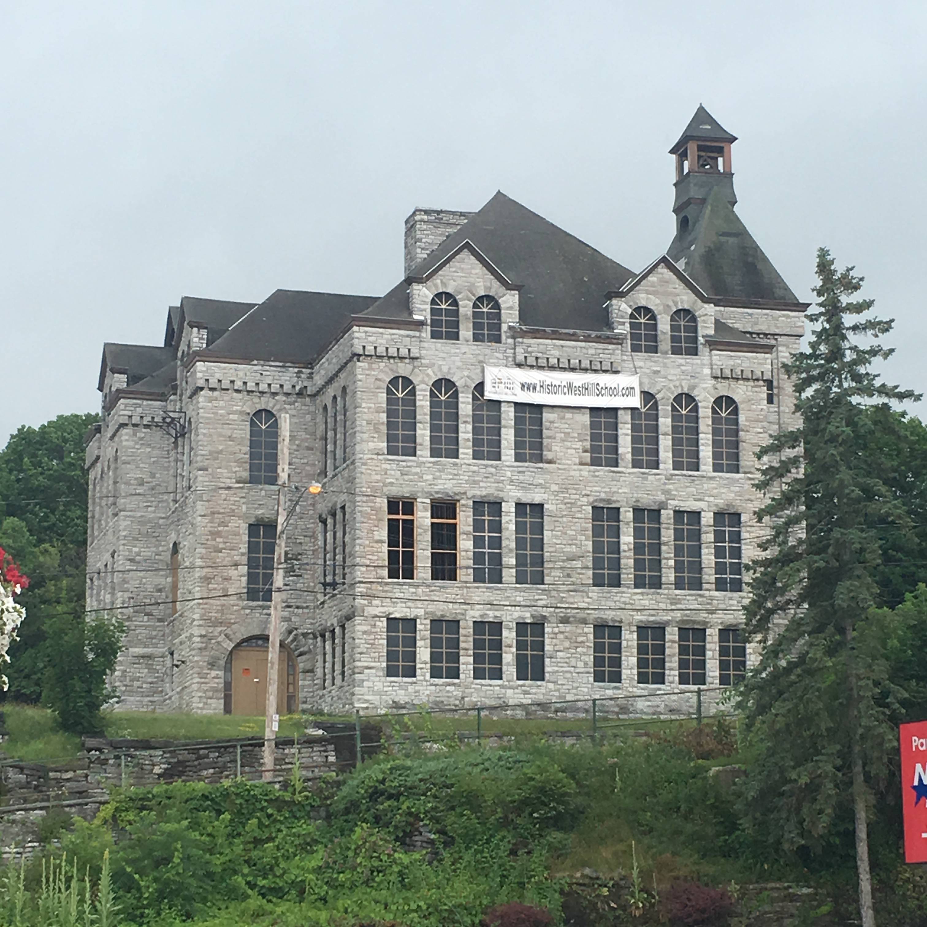 The old, and gorgeous, building is a school.