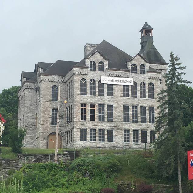 The old, and gorgeous, building is a school.